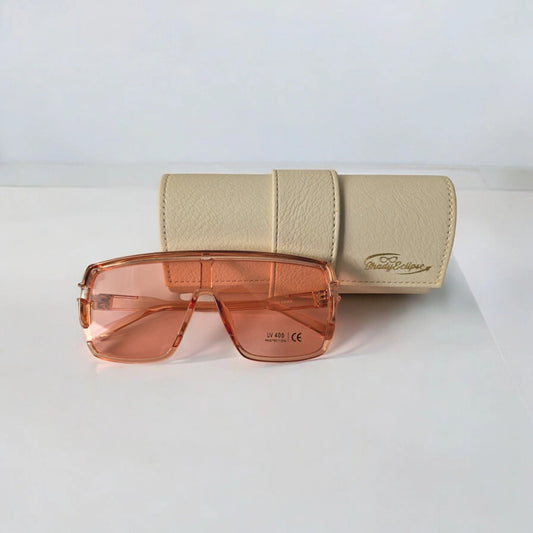 Solar Flare Oversized SunglassesThe Solar Flare sunglasses stand out with their bold pink-tinted lenses and matching semi-transparent pink frame. This pair captures the sun's vibrant energy, offeriMy StoreMy StoreSolar Flare Oversized Sunglasses